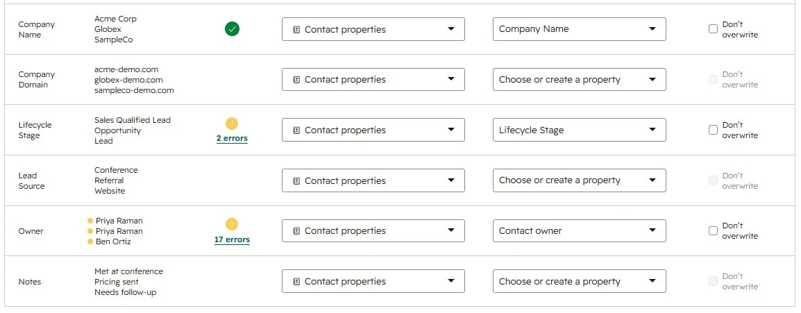 HubSpot mapping screen with Company Domain, Lead Source, and Notes left on Choose or create a property while other columns matched automatically